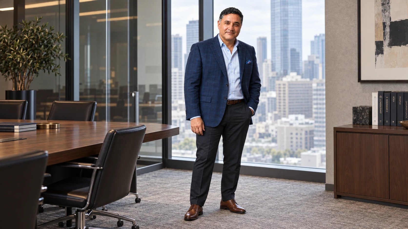 Illustrative editorial portrait of Emilio Figueroa standing beside the windows of a walnut and glass boardroom.